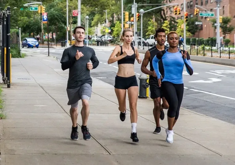 People running on Rochester city streets